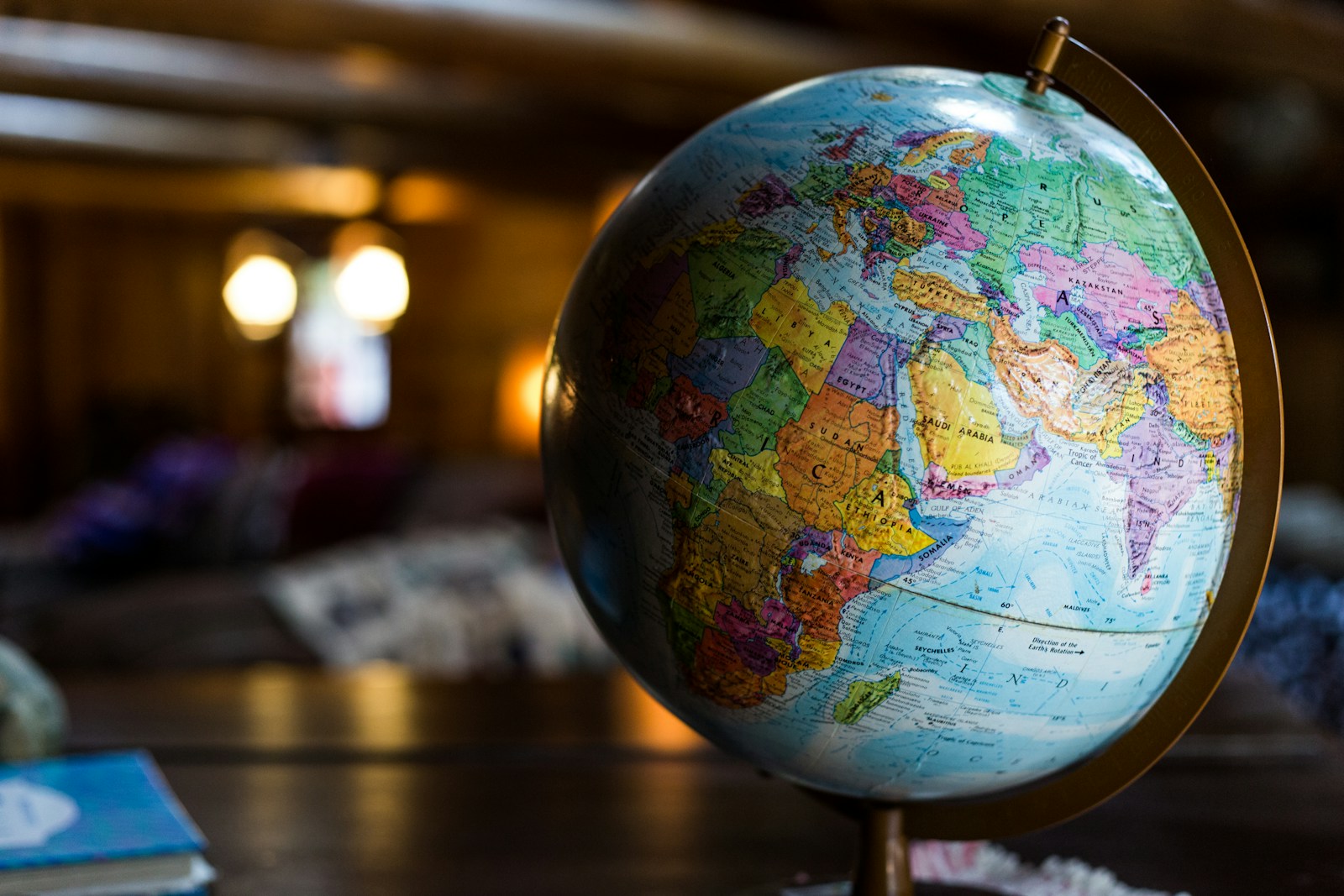 A desk globe representing the worldwide scope of the article